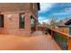 Expansive deck area with outdoor seating, providing a great view of the surrounding yard at 2568 Clermont St, Denver, CO 80207