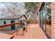Spacious outdoor deck with ample seating, perfect for enjoying the fresh air and sunshine at 2568 Clermont St, Denver, CO 80207