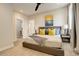 Serene main bedroom with neutral tones, stylish decor, and ample natural light at 2568 Clermont St, Denver, CO 80207