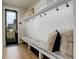 Convenient mud room with built-in storage and seating, perfect for keeping organized at 2568 Clermont St, Denver, CO 80207