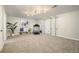 Spacious recreational room with carpet floors and a designated exercise area with plenty of room to play at 16438 E Prentice Cir, Centennial, CO 80015
