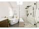 Bright bathroom featuring a soaking tub, a walk-in shower, and natural light at 16438 E Prentice Cir, Centennial, CO 80015