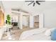Bright bedroom featuring a desk and workspace with a view of the home's interiors at 16438 E Prentice Cir, Centennial, CO 80015