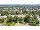 Residential building with mature trees, showcasing serene environment with manicured lawns, creating a park-like setting at 745 S Alton Way # 11A, Denver, CO 80247