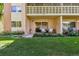 Charming condo building with well-maintained landscaping and inviting outdoor patio at 745 S Alton Way # 11A, Denver, CO 80247