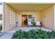 Inviting outdoor patio with welcoming rocking chairs and beautiful landscaping, perfect for relaxing at 745 S Alton Way # 11A, Denver, CO 80247