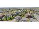 Expansive aerial view of a suburban neighborhood with well-maintained homes and green spaces, creating a peaceful community setting at 3761 S Orleans St, Aurora, CO 80013