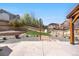 Spacious backyard featuring a patio, well-kept lawn, and ample room at 3761 S Orleans St, Aurora, CO 80013