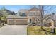 Charming two-story home with a spacious three-car garage and welcoming front porch at 3761 S Orleans St, Aurora, CO 80013