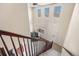 Bright foyer with a high ceiling and view of the front entrance from the second floor at 3761 S Orleans St, Aurora, CO 80013