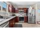 Well-equipped kitchen with stainless steel appliances, custom cabinets, and granite countertops at 3761 S Orleans St, Aurora, CO 80013