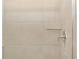 Close-up of shower with a glass shelf and modern fixtures at 17417 E 89Th Way, Commerce City, CO 80022