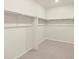 Empty walk-in closet showing basic shelving at 17417 E 89Th Way, Commerce City, CO 80022