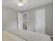 Inviting bedroom with connecting door and comfortable carpet at 5870 S Perth Pl, Centennial, CO 80015