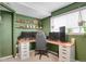 Bright home office with natural light, floating shelves, and ergonomic setup at 5870 S Perth Pl, Centennial, CO 80015