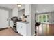 Modern kitchen with granite countertops, stainless steel appliances, and an open layout at 5870 S Perth Pl, Centennial, CO 80015