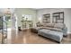 Inviting living room with hardwood floors, comfortable seating, and an open layout at 5870 S Perth Pl, Centennial, CO 80015