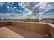 Rooftop deck offers panoramic views of the neighborhood and blue skies at 10071 Yampa Ct, Commerce City, CO 80022