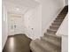 A welcoming entryway with hardwood floors, a staircase, and ample natural light at 10071 Yampa Ct, Commerce City, CO 80022