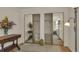 Bedroom closet with mirrored doors, offering ample storage and organization space at 13901 E Marina Dr # 113, Aurora, CO 80014