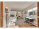 Bright home office with wood floors, built-in cabinets, and a view of the outdoors at 13901 E Marina Dr # 113, Aurora, CO 80014
