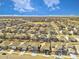 Sprawling community featuring similar homes near open spaces and mountains at 885 Hearthstone Ave, Brighton, CO 80601