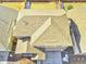 Detailed aerial view of a well-maintained roof, highlighting its structure, material, and surrounding landscape at 885 Hearthstone Ave, Brighton, CO 80601