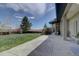 Expansive backyard boasts mature landscaping, a patio, and is bordered by a wood fence offering privacy at 14993 W 55Th Dr, Golden, CO 80403