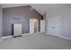 Bedroom with vaulted ceilings and ensuite bathroom access at 14993 W 55Th Dr, Golden, CO 80403