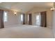 Expansive bedroom with vaulted ceiling and patio access at 14993 W 55Th Dr, Golden, CO 80403