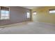 Bedroom with neutral carpet, multiple windows, and two-tone paint at 14993 W 55Th Dr, Golden, CO 80403