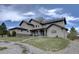 Attractive exterior view of a home with a landscaped yard on a sunny day at 14993 W 55Th Dr, Golden, CO 80403