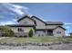 Stunning home featuring a beautiful stone accent and manicured front yard at 14993 W 55Th Dr, Golden, CO 80403