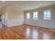 Spacious living room with hardwood floors and ample natural light at 14993 W 55Th Dr, Golden, CO 80403