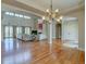 Open-concept living area filled with natural light and hardwood floors throughout at 14993 W 55Th Dr, Golden, CO 80403