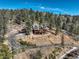 Beautiful home with multiple decks offering stunning views of the surrounding forest at 11450 Marks Dr, Conifer, CO 80433