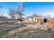 A private backyard with a patio area perfect for outdoor entertaining and relaxation under the open sky at 1050 Uvalda St, Aurora, CO 80011