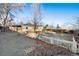 Spacious backyard featuring a weathered fence and plenty of potential for outdoor living and landscaping at 1050 Uvalda St, Aurora, CO 80011