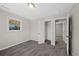 Cozy bedroom featuring neutral walls, closet and soft gray carpeting at 1050 Uvalda St, Aurora, CO 80011