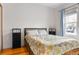 Cozy bedroom with natural light and hardwood floors at 3034 N High St, Denver, CO 80205