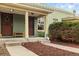 Inviting front porch with manicured landscaping at 3034 N High St, Denver, CO 80205