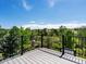 Spacious deck with open views overlooking lush greenery offers a tranquil escape and a picturesque setting at 10057 S Shadow Hill Dr, Lone Tree, CO 80124