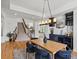 Open-concept dining room is ideal for entertaining, complete with a wet bar and backyard access at 10057 S Shadow Hill Dr, Lone Tree, CO 80124