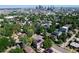 Panoramic aerial view of neighborhood featuring the city skyline in the background at 3512 Wyandot St, Denver, CO 80211