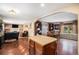 Open floorplan combining a kitchen with a granite island with the living room at 3164 S Nucla St, Aurora, CO 80013