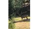 A mature buck deer walks the grounds of this Colorado home at 11932 Coal Creek Heights Dr, Golden, CO 80403