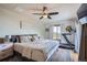 Comfortable bedroom with plush bedding, natural light, and a view to the outdoors at 11932 Coal Creek Heights Dr, Golden, CO 80403