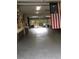 Spacious garage with epoxy flooring and American flag at 11932 Coal Creek Heights Dr, Golden, CO 80403