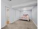 Cozy finished basement bedroom with carpet and a queen bed at 2069 E 116Th Ave, Northglenn, CO 80233