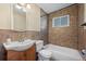 Charming bathroom with tiled shower, vanity, and brushed chrome fixtures at 2069 E 116Th Ave, Northglenn, CO 80233